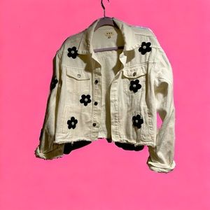 Pol Jean Jacket with embellished black flowers.